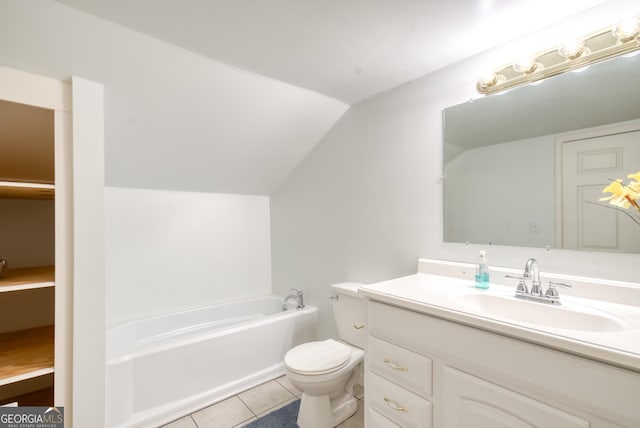 1650 Pierce Dairy Rd, Madison, GA 30650 - bathroom featuring a bath, toilet, vanity, vaulted ceiling, and tile patterned floors