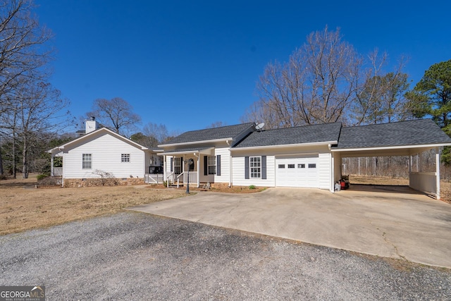 1650 Pierce Dairy Rd, Madison, GA 30650 - single story home featuring an attached garage, driveway, an attached carport, and a porch