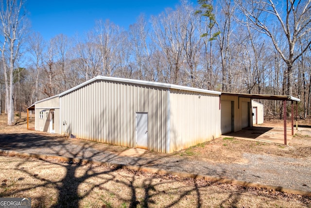 1650 Pierce Dairy Rd, Madison, GA 30650 - exterior space featuring driveway and an outdoor structure