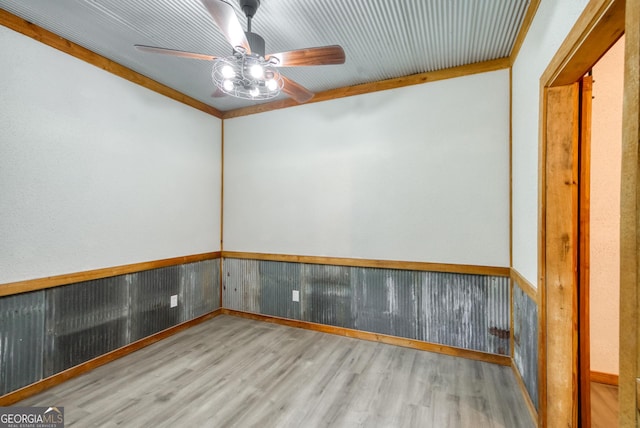 1650 Pierce Dairy Rd, Madison, GA 30650 - unfurnished room with wood finished floors, baseboards, and a ceiling fan