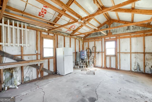 1650 Pierce Dairy Rd, Madison, GA 30650 - miscellaneous room featuring a garage, plenty of natural light, and lofted ceiling