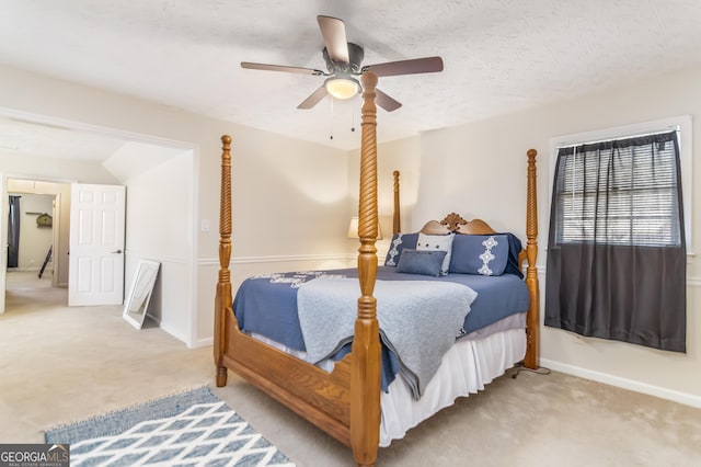 bedroom featuring baseboards, carpet, ceiling fan, and a textured ceiling