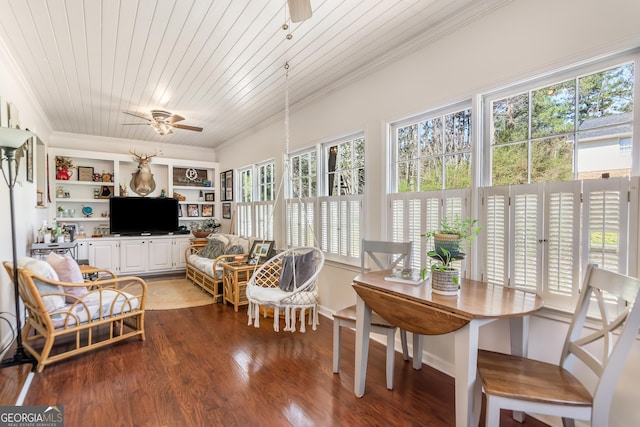 sunroom / solarium featuring wooden ceiling and ceiling fan