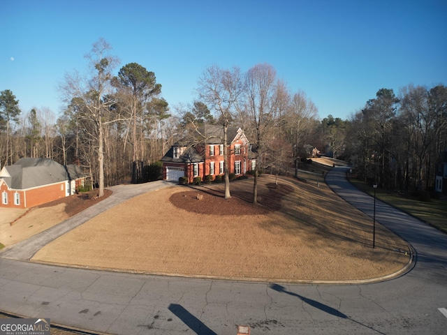 view of front facade with a garage and driveway