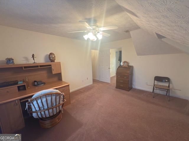 home office with light carpet, baseboards, a textured ceiling, and a ceiling fan