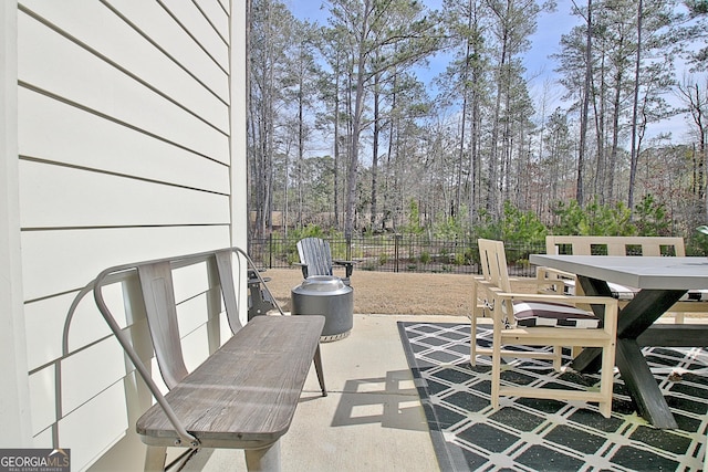 view of patio with fence