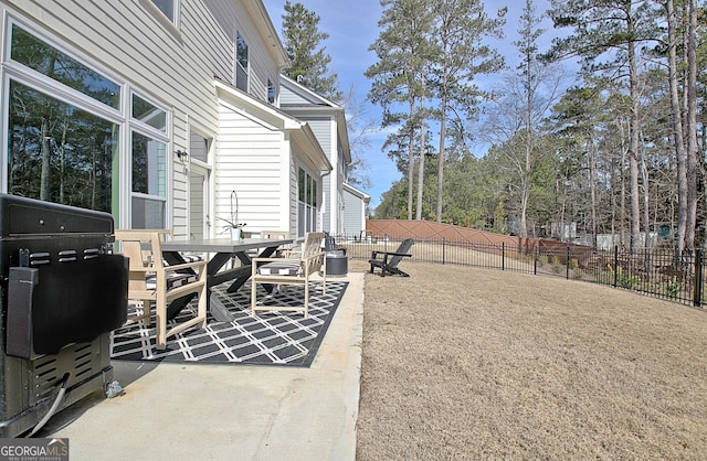 view of patio / terrace with a fenced backyard and outdoor dining space