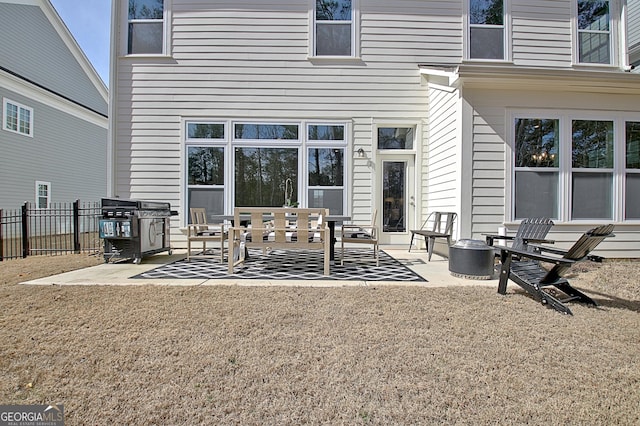 view of patio / terrace featuring fence