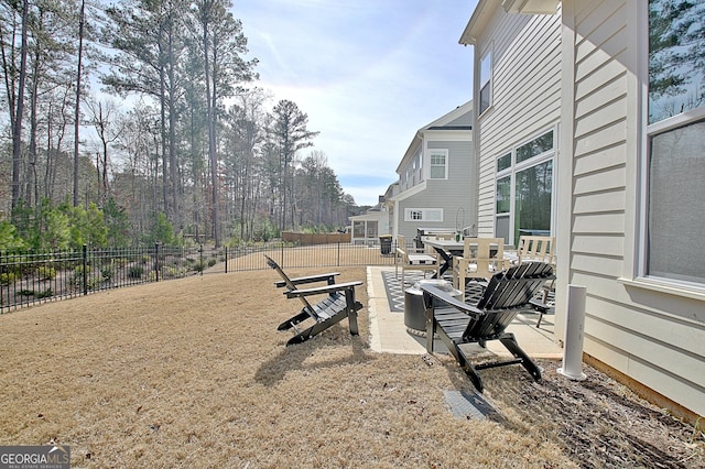 view of yard featuring a patio area and fence