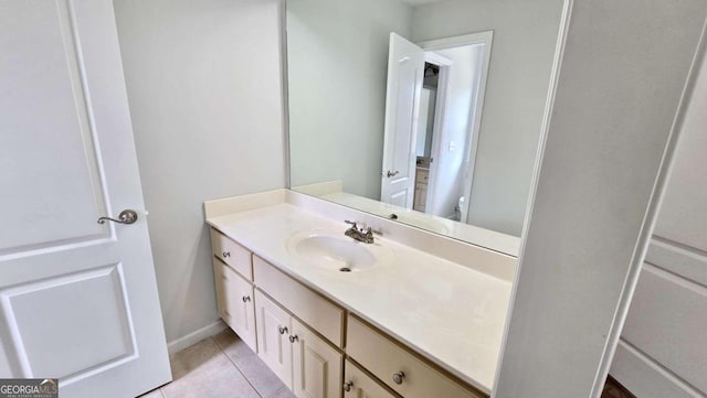 838 Natchez Valley Trce NE, Grayson, GA 30017 - bathroom with vanity and tile patterned floors