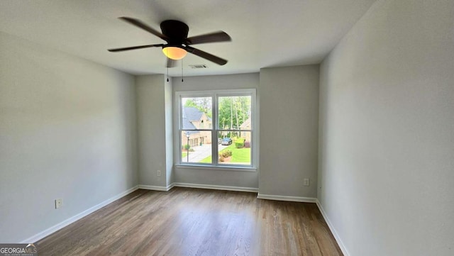 838 Natchez Valley Trce NE, Grayson, GA 30017 - empty room featuring wood finished floors and a ceiling fan