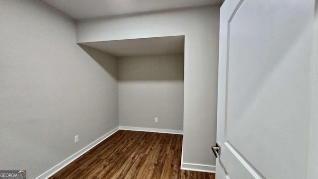838 Natchez Valley Trce NE, Grayson, GA 30017 - unfurnished room featuring dark wood-type flooring and baseboards