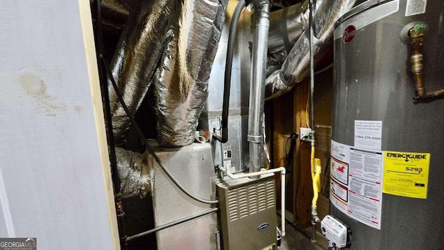 838 Natchez Valley Trce NE, Grayson, GA 30017 - utility room with gas water heater