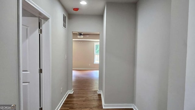 838 Natchez Valley Trce NE, Grayson, GA 30017 - corridor with dark wood-type flooring and baseboards