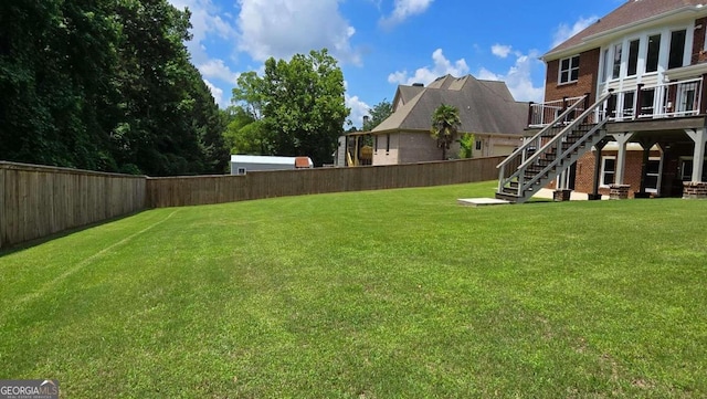 838 Natchez Valley Trce NE, Grayson, GA 30017 - fenced backyard featuring stairway and a deck