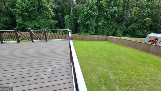 838 Natchez Valley Trce NE, Grayson, GA 30017 - wooden terrace featuring a fenced backyard