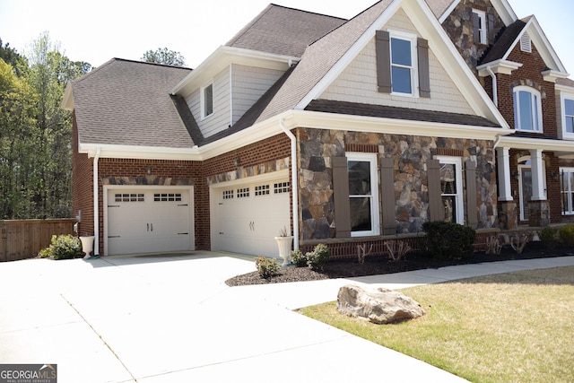 838 Natchez Valley Trce NE, Grayson, GA 30017 - craftsman-style home featuring concrete driveway, covered porch, a shingled roof, an attached garage, and brick siding
