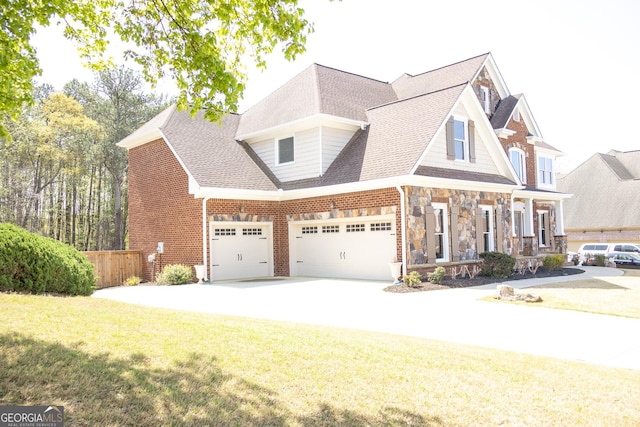 838 Natchez Valley Trce NE, Grayson, GA 30017 - view of front of house with concrete driveway, a garage, roof with shingles, brick siding, and stone siding