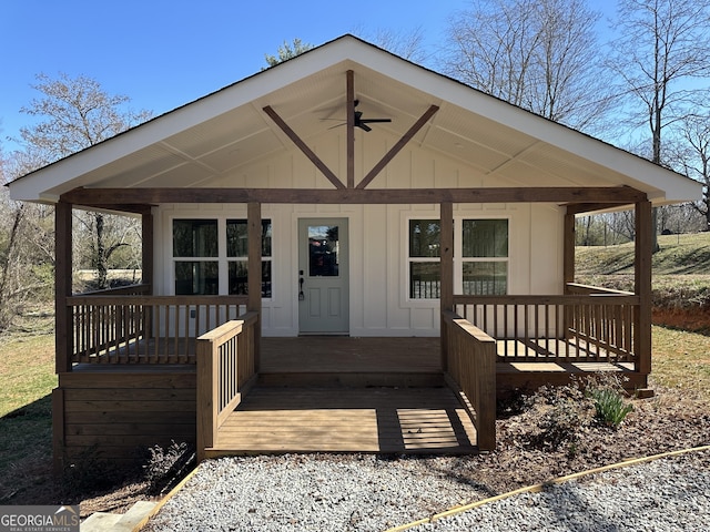 property entrance featuring board and batten siding