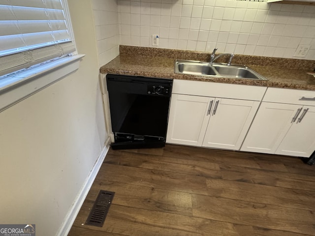 2976 Nelson Dr, Duluth, GA 30096 - kitchen with dishwasher, dark wood-type flooring, tasteful backsplash, white cabinetry, and dark countertops