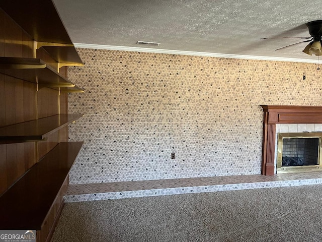 storage room with visible vents and a ceiling fan