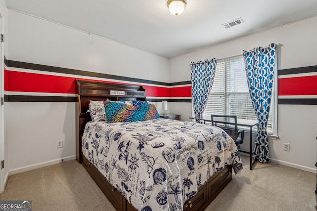 bedroom with visible vents, carpet floors, and baseboards