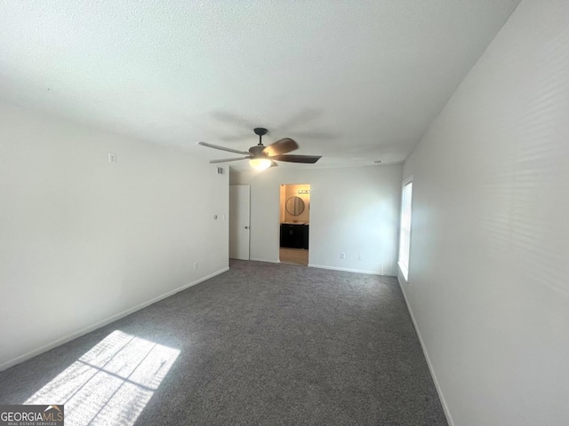 unfurnished living room featuring ceiling fan, baseboards, carpet flooring, and a textured ceiling