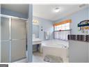 2000 Spicers Ln, Woodstock, GA 30189 - bathroom with a stall shower