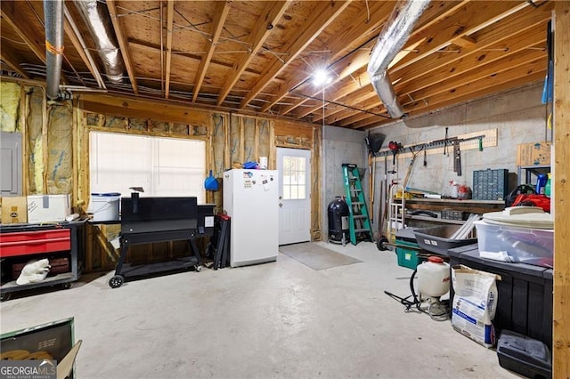2000 Spicers Ln, Woodstock, GA 30189 - basement with electric panel and freestanding refrigerator