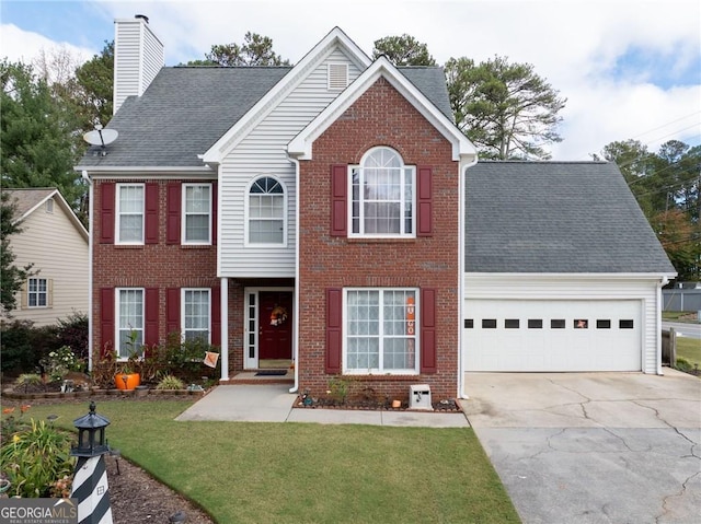 2000 Spicers Ln, Woodstock, GA 30189 - colonial house featuring a front lawn, brick siding, a garage, and driveway