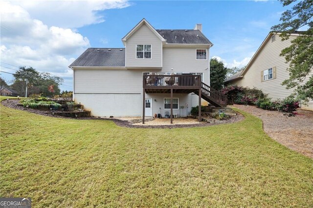 2000 Spicers Ln, Woodstock, GA 30189 - rear view of house featuring a wooden deck, stairs, a yard, and roof with shingles