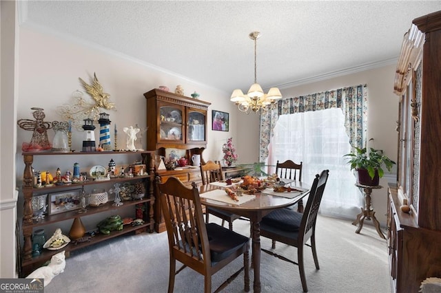 2000 Spicers Ln, Woodstock, GA 30189 - dining space with light carpet, a notable chandelier, ornamental molding, and a textured ceiling