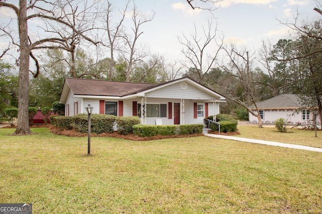 view of front facade featuring a front yard