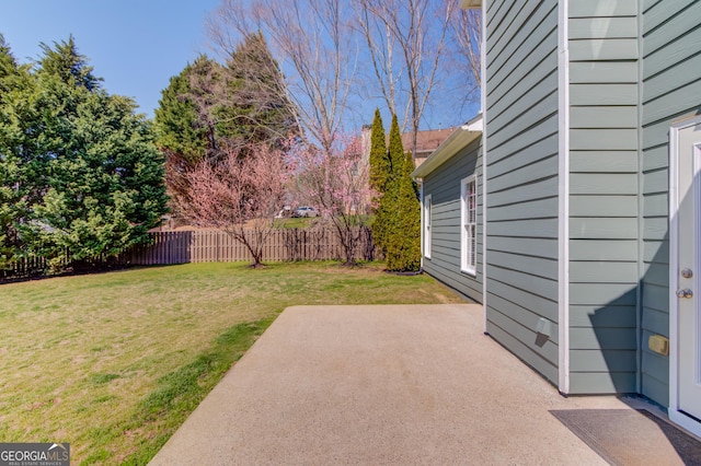 view of yard with a patio area and fence