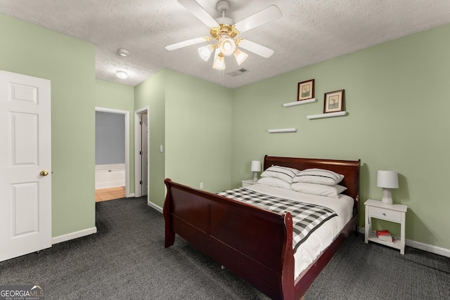 bedroom featuring visible vents, baseboards, carpet floors, and a textured ceiling