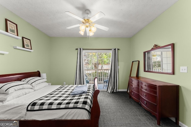 bedroom featuring baseboards, ceiling fan, dark carpet, a textured ceiling, and access to outside