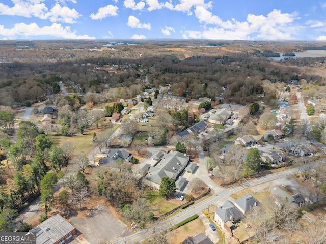 birds eye view of property with a residential view