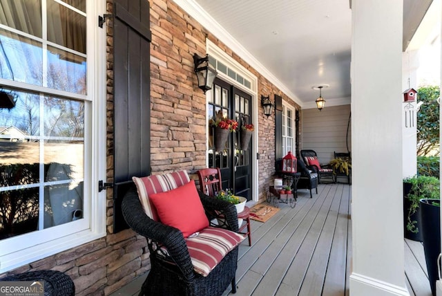 wooden terrace with covered porch