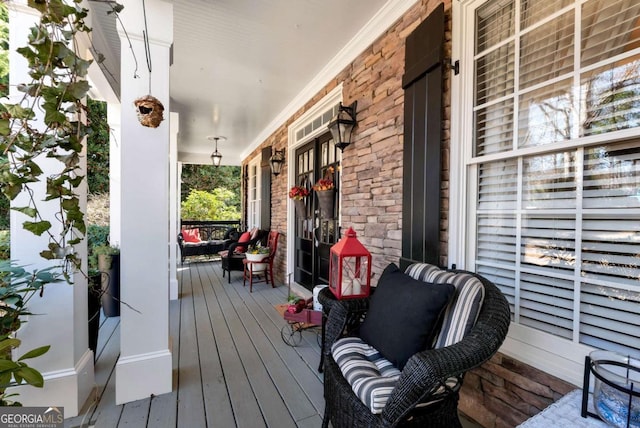 deck with covered porch