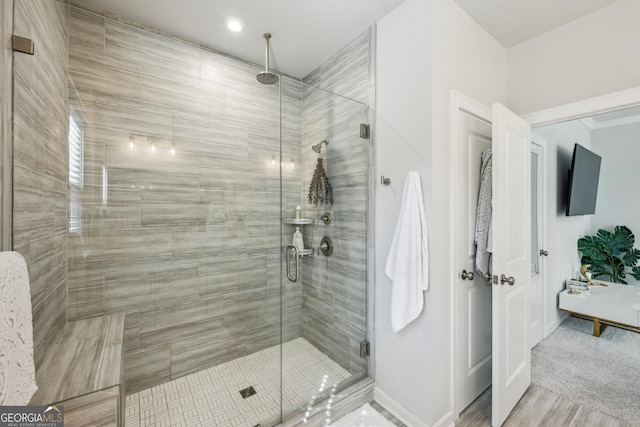 1322 Stanley Park Dr, Decatur, GA 30033 - bathroom featuring a stall shower and baseboards