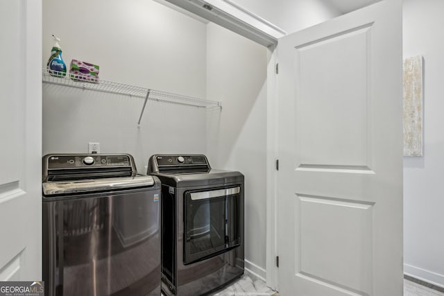 1322 Stanley Park Dr, Decatur, GA 30033 - laundry room featuring laundry area, marble finish floor, baseboards, and separate washer and dryer