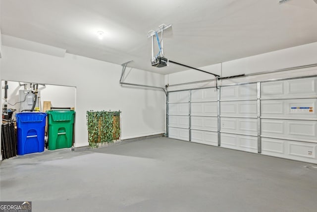 1322 Stanley Park Dr, Decatur, GA 30033 - garage featuring a garage door opener