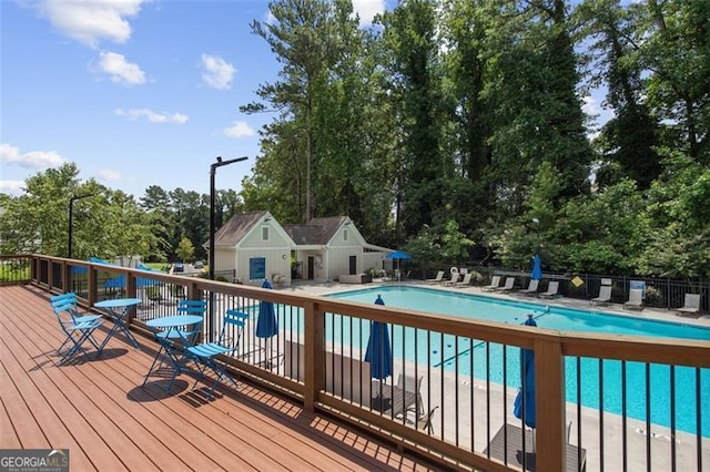 1322 Stanley Park Dr, Decatur, GA 30033 - pool featuring a patio, fence, a wooden deck, and an outdoor structure