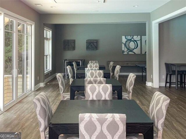 1322 Stanley Park Dr, Decatur, GA 30033 - dining space with baseboards and wood finished floors