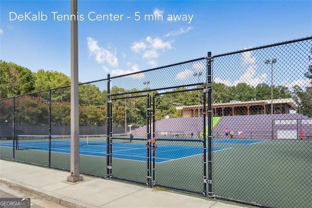 1322 Stanley Park Dr, Decatur, GA 30033 - view of tennis court with a gate and fence
