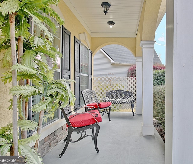 view of patio featuring a porch