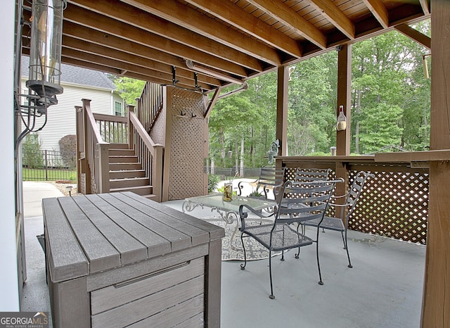 65 Tapestry Ln, Newnan, GA 30265 - view of patio / terrace featuring stairs, outdoor dining space, and fence