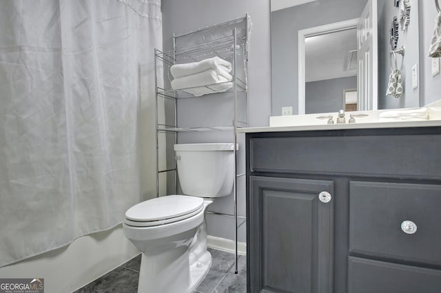 full bath with toilet, vanity, and shower / tub combo with curtain