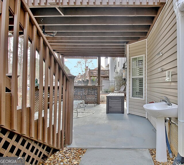 65 Tapestry Ln, Newnan, GA 30265 - view of patio featuring stairs and fence