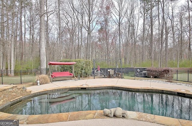 view of pool featuring a gazebo, a patio area, and a fenced backyard